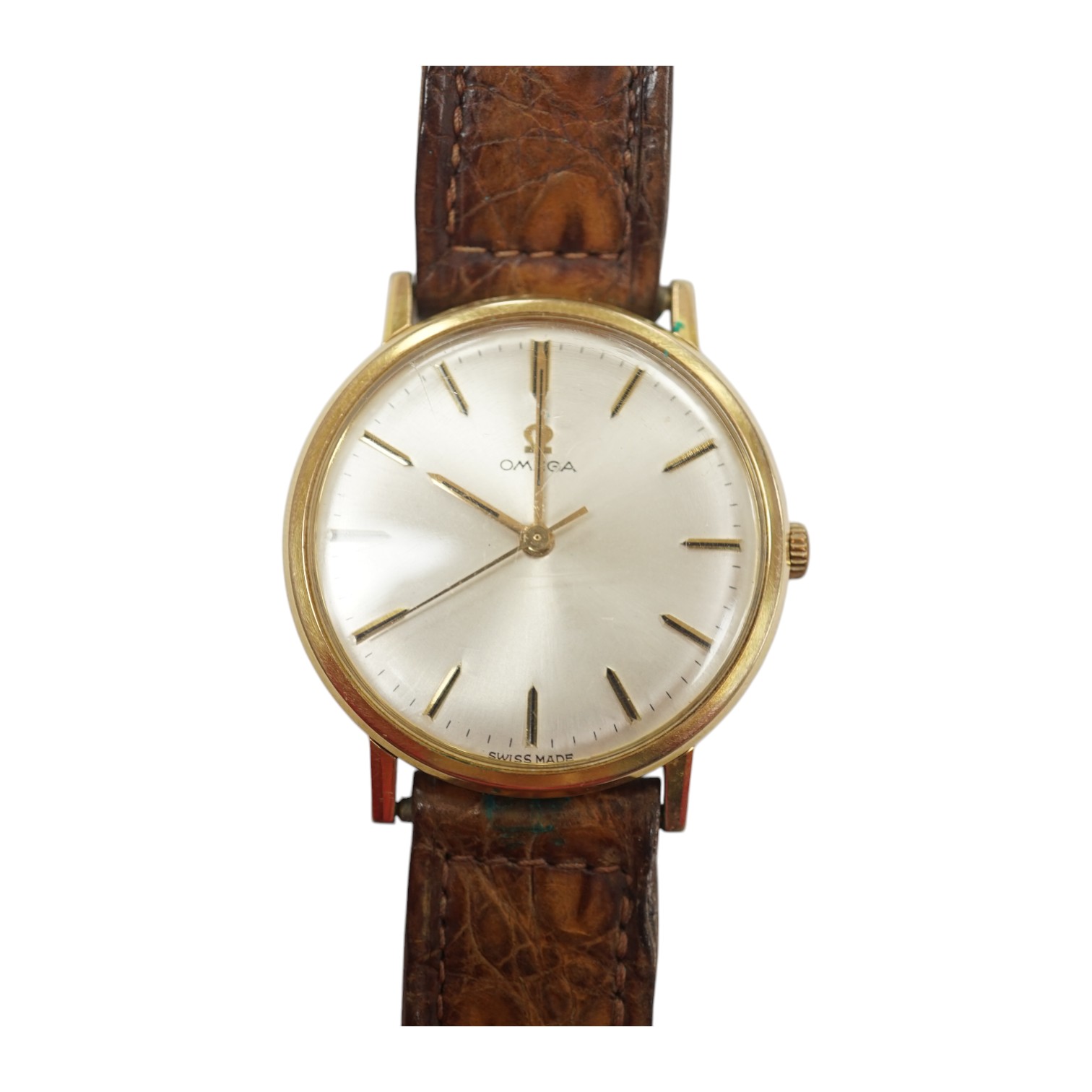 A gentleman's gold plated Omega manual wind wrist watch, on a leather strap, case diameter 34mm. Condition - Fair